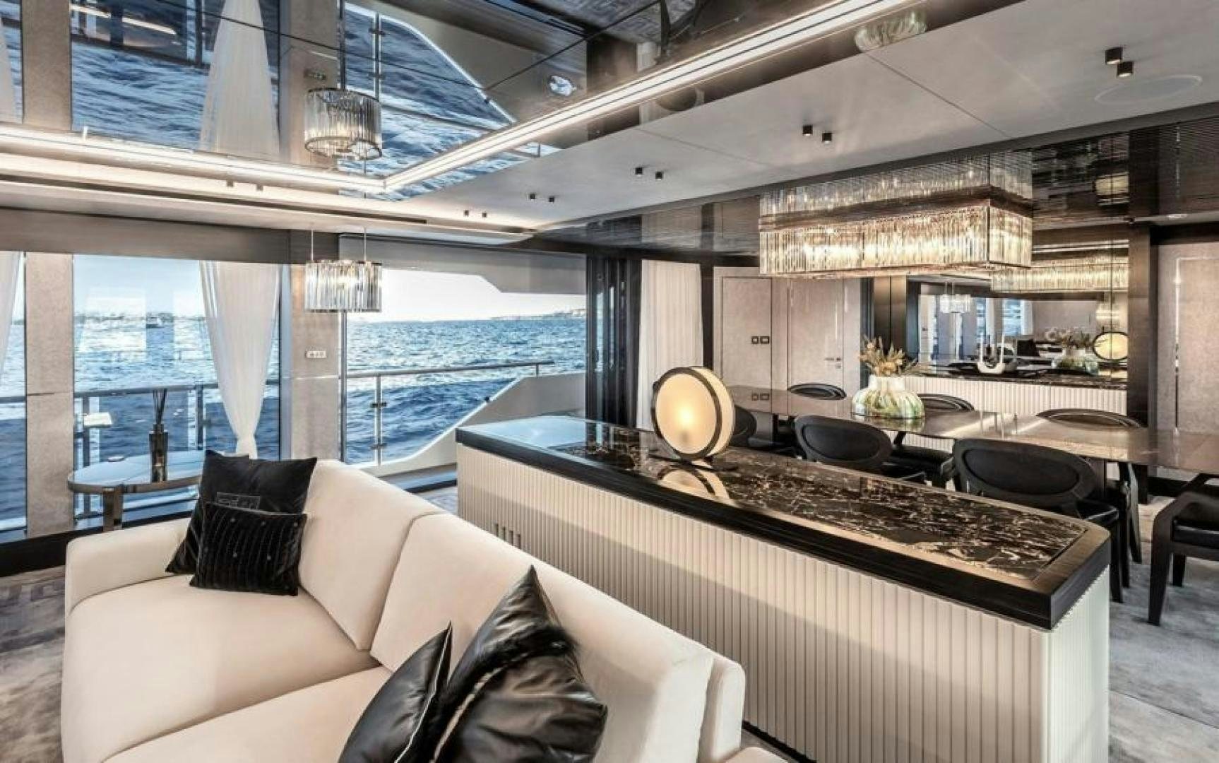 a living room with a large window aboard NUMARINE 37XP 17 Yacht for Sale