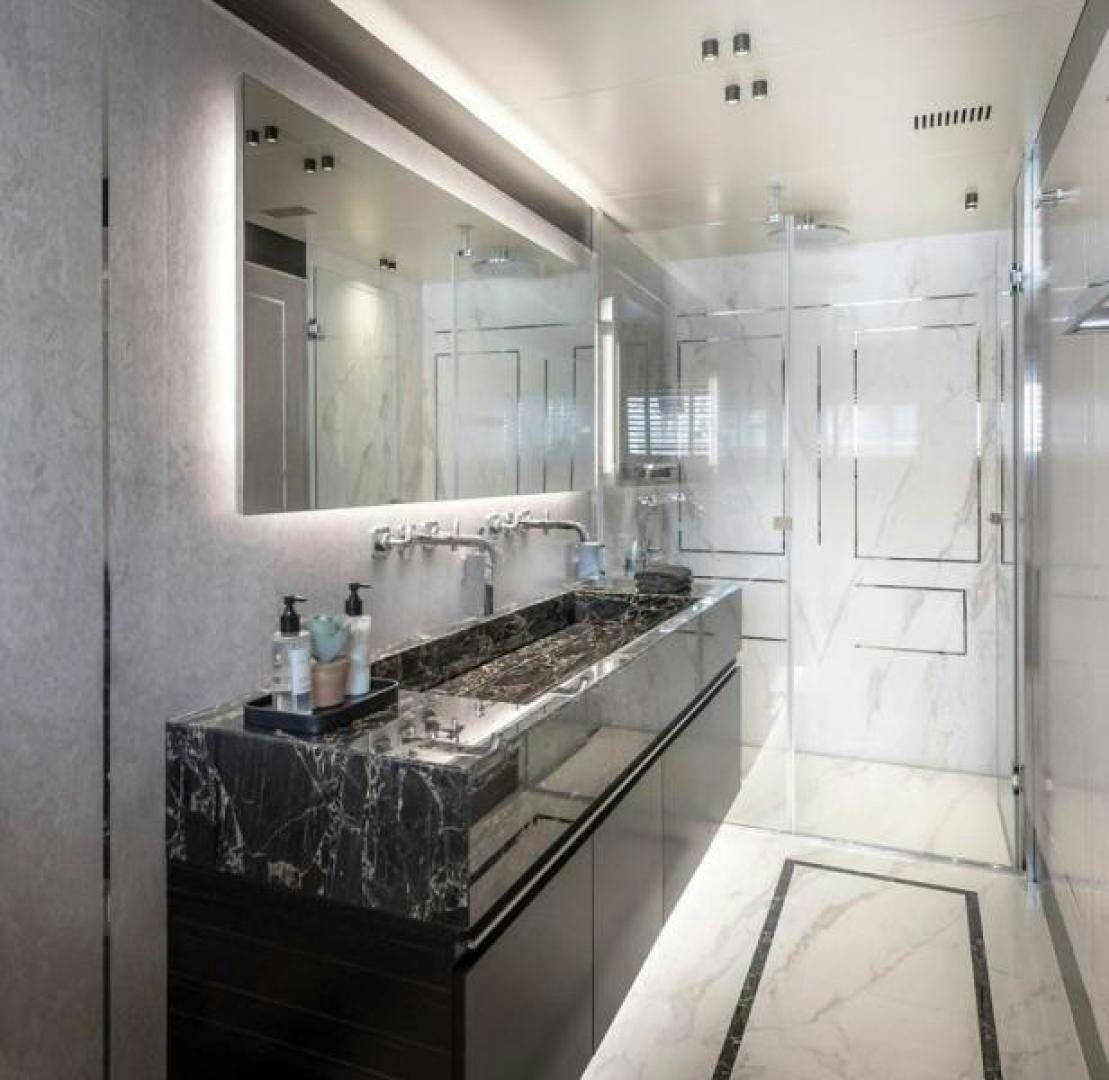 a bathroom with a marble counter top aboard NUMARINE 37XP 17 Yacht for Sale