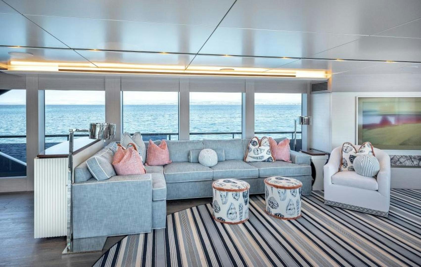 a living room with a large window aboard NUMARINE 37XP 17 Yacht for Sale