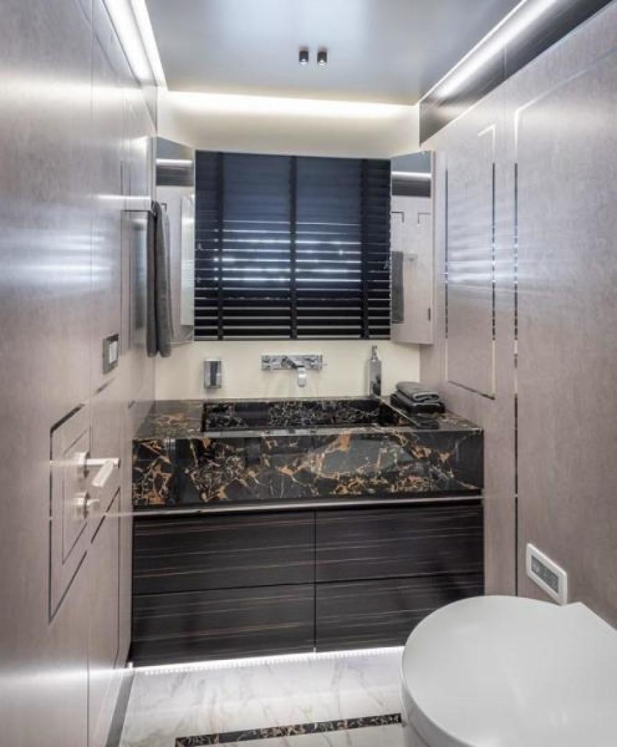a kitchen with a stainless steel stove aboard NUMARINE 37XP 17 Yacht for Sale