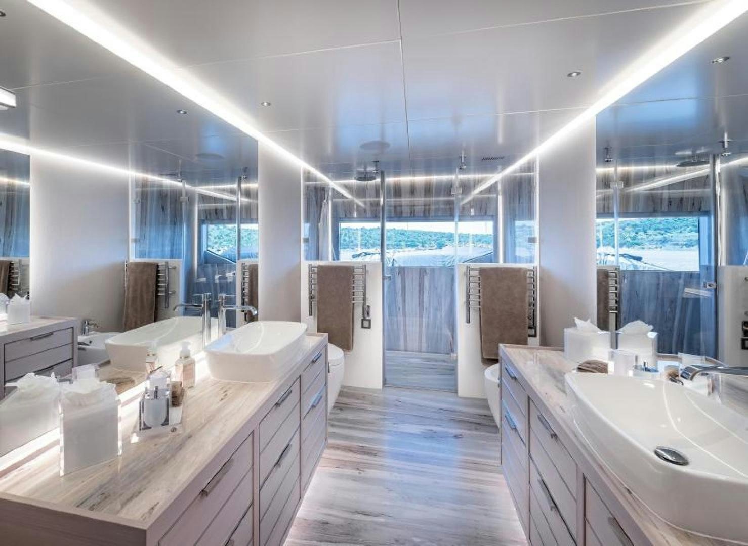 a bathroom with a large window aboard NUMARINE 37XP 17 Yacht for Sale