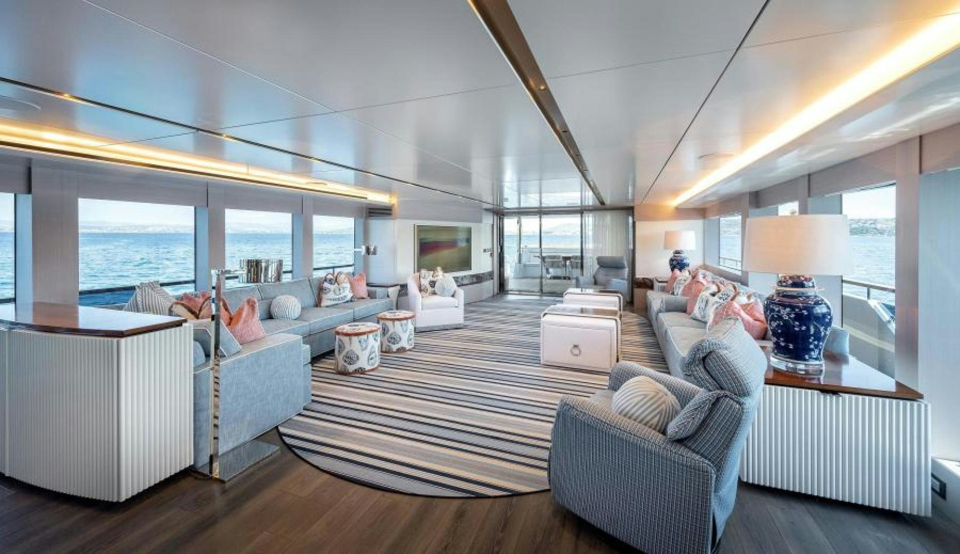 a living room with a large window aboard NUMARINE 37XP 17 Yacht for Sale