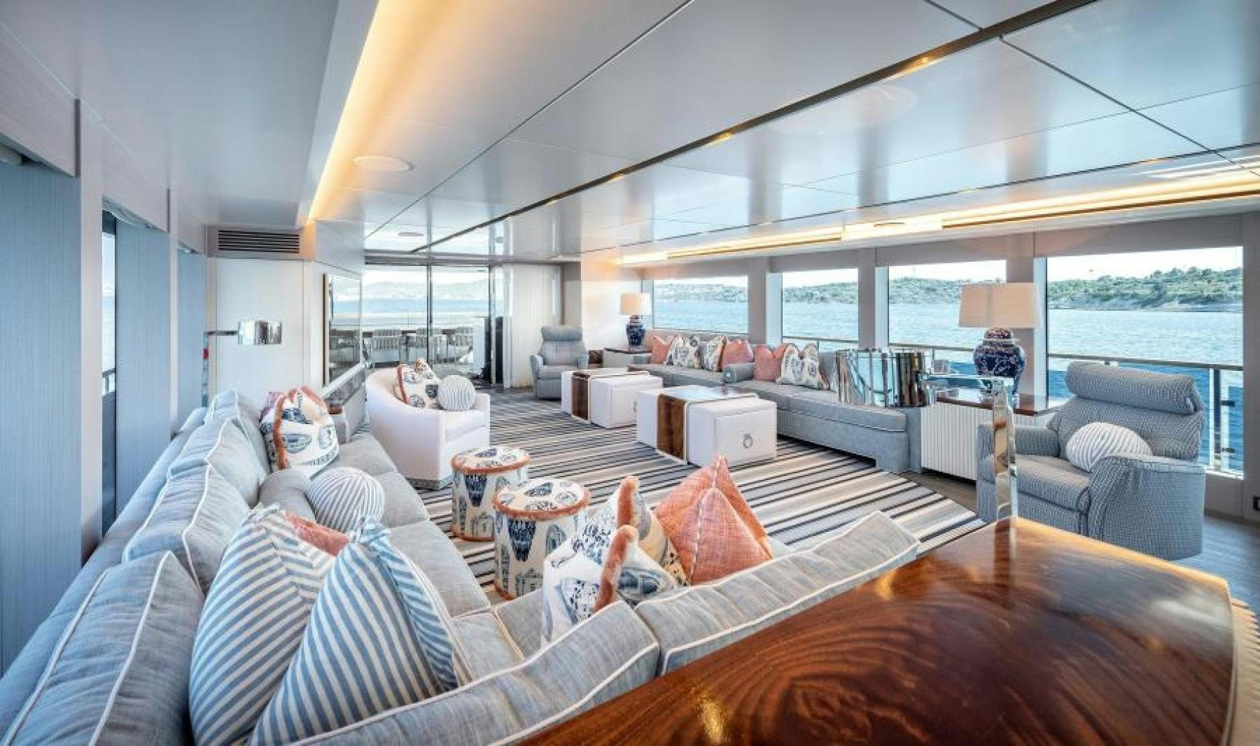 a living room with a large window aboard NUMARINE 37XP 17 Yacht for Sale