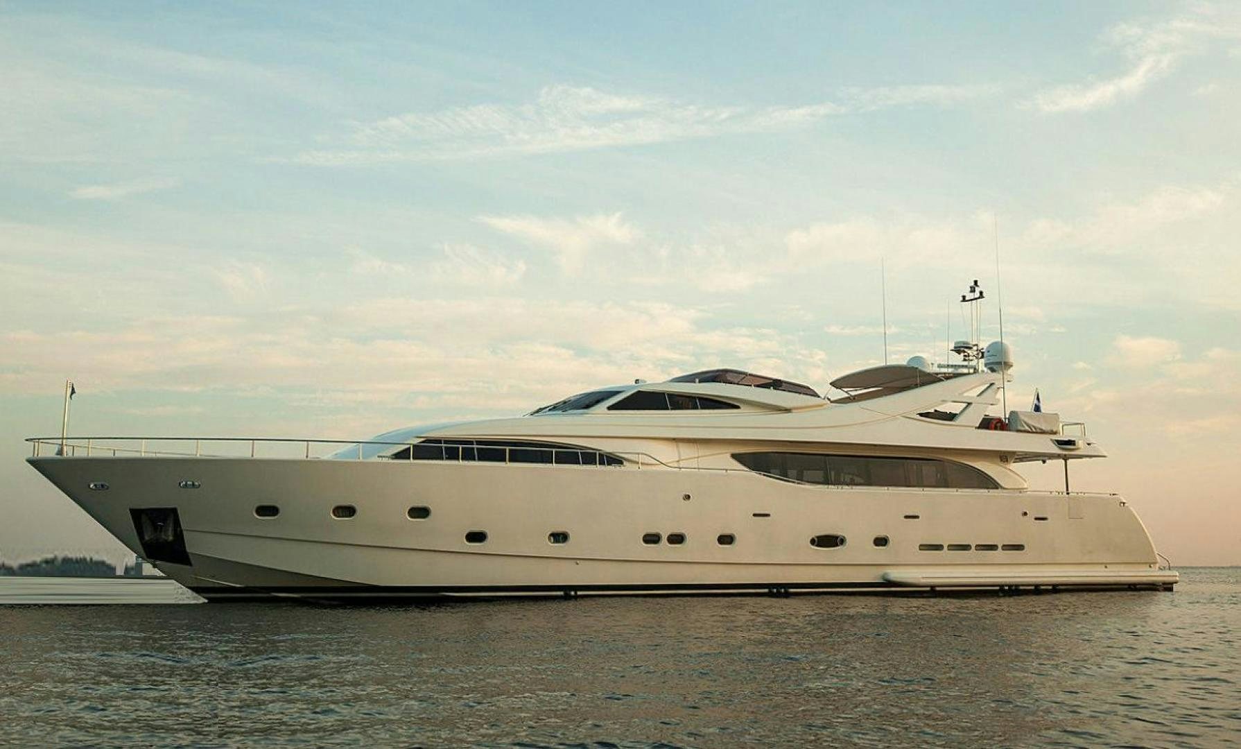 a large white yacht aboard CHAMPAGNE & CAVIAR Yacht for Sale