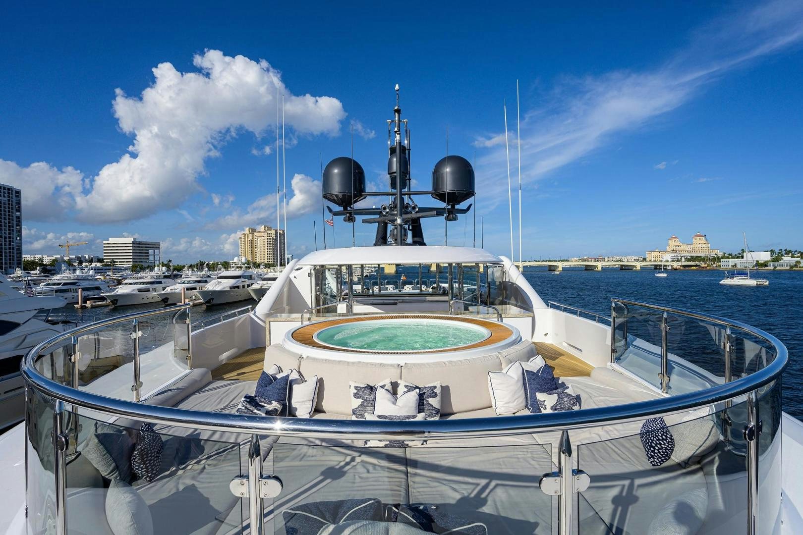 a boat with a water slide and a satellite dish on the deck aboard SEANASH Yacht for Sale