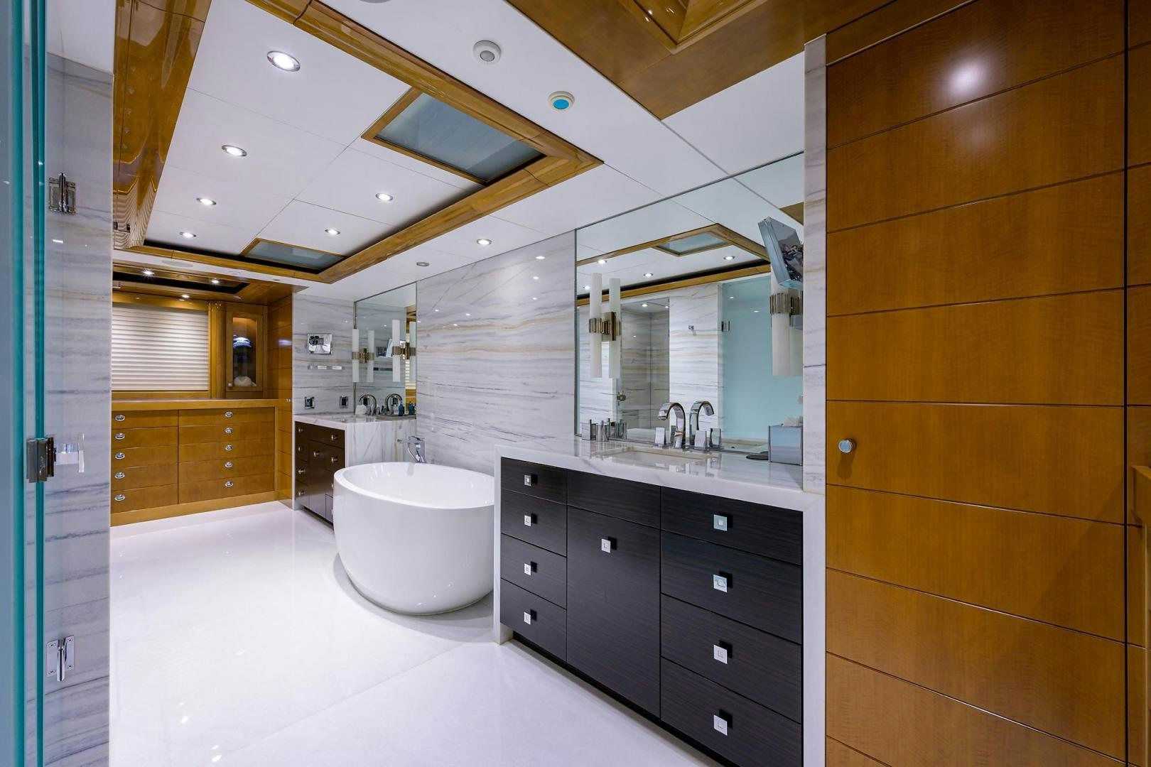 a bathroom with a toilet and a sink aboard SEANASH Yacht for Sale