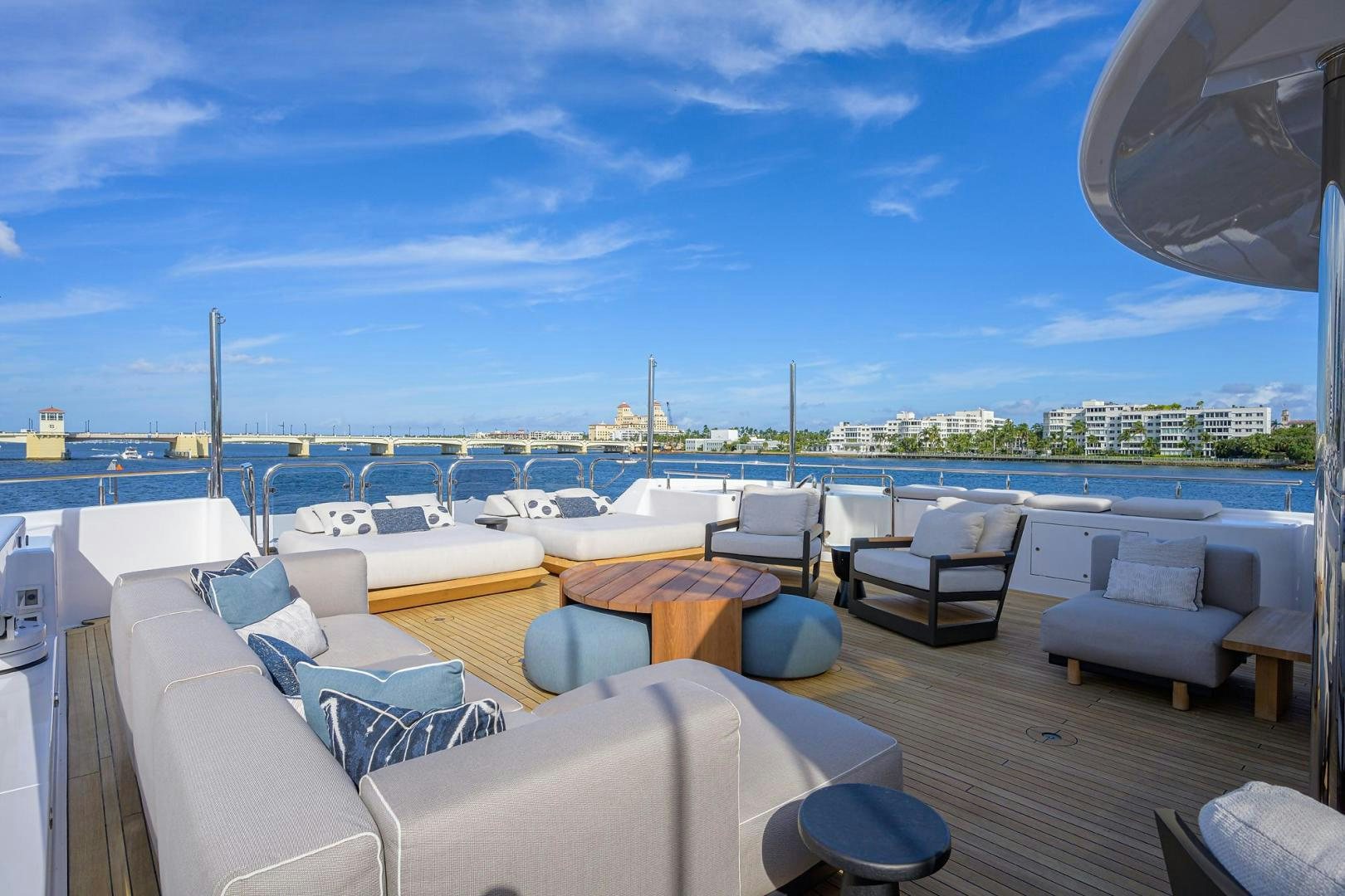 a deck with chairs and tables on it aboard SEANASH Yacht for Sale