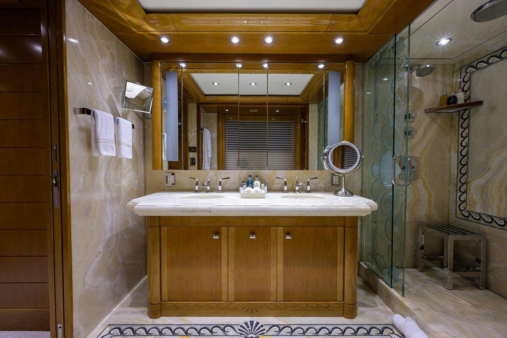 a bathroom with a sink and a mirror aboard SEANASH Yacht for Sale