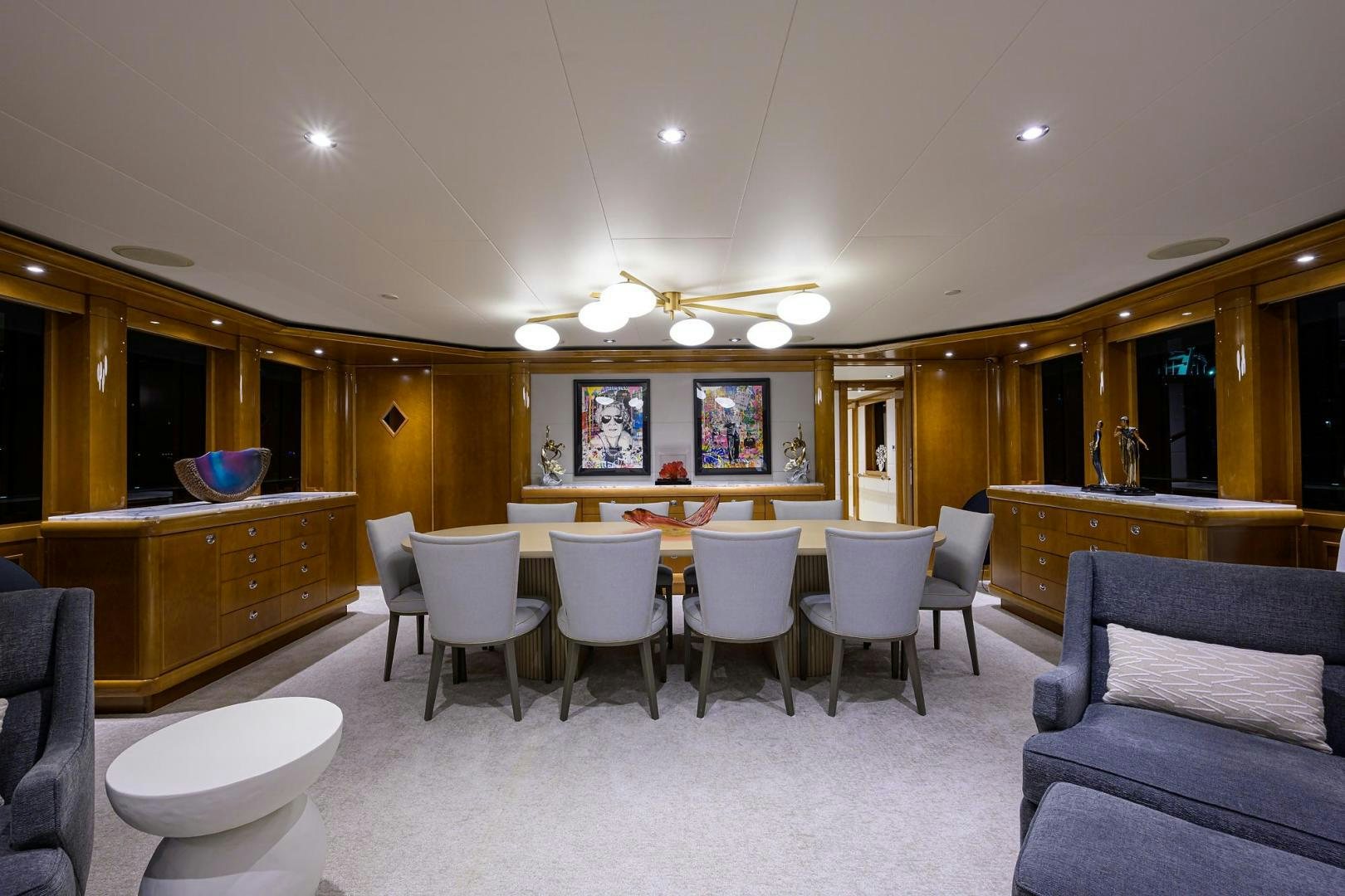 a large room with a table and chairs aboard SEANASH Yacht for Sale