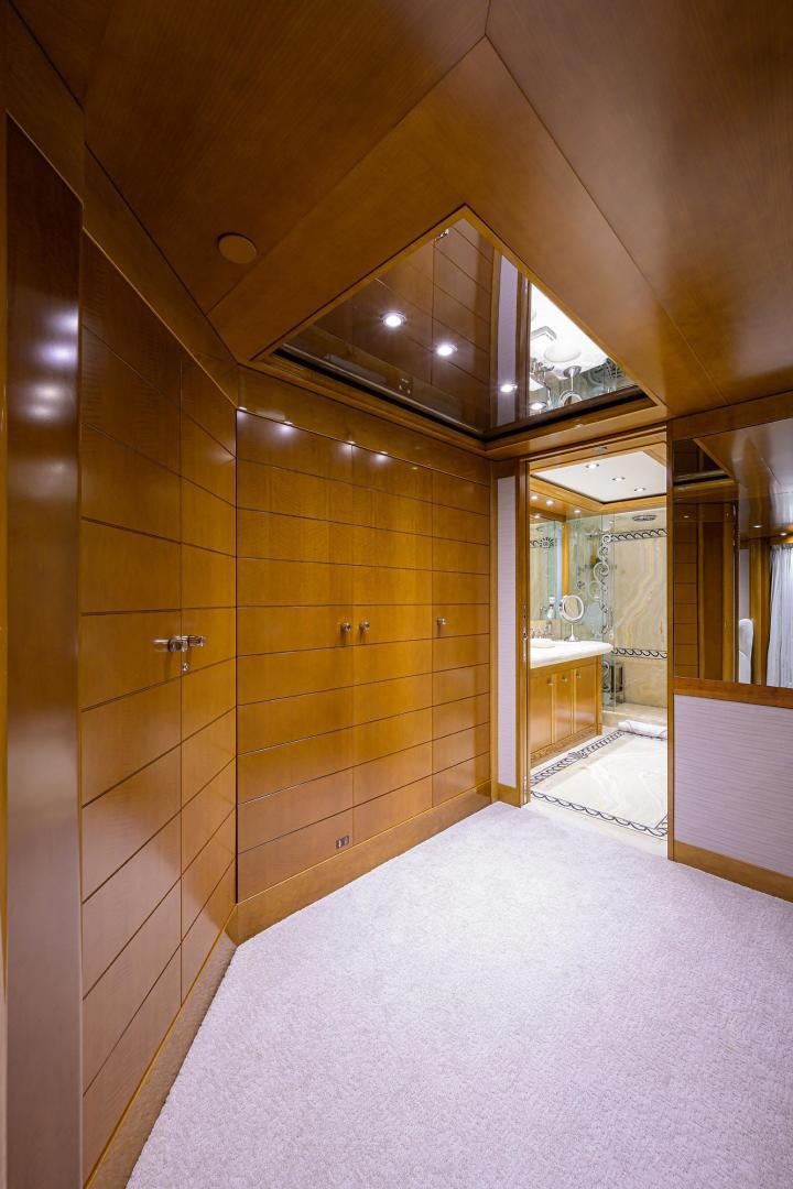 a bathroom with a large mirror aboard SEANASH Yacht for Sale