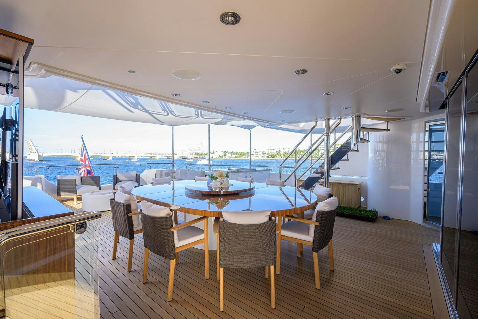 a room with a table and chairs aboard SEANASH Yacht for Sale