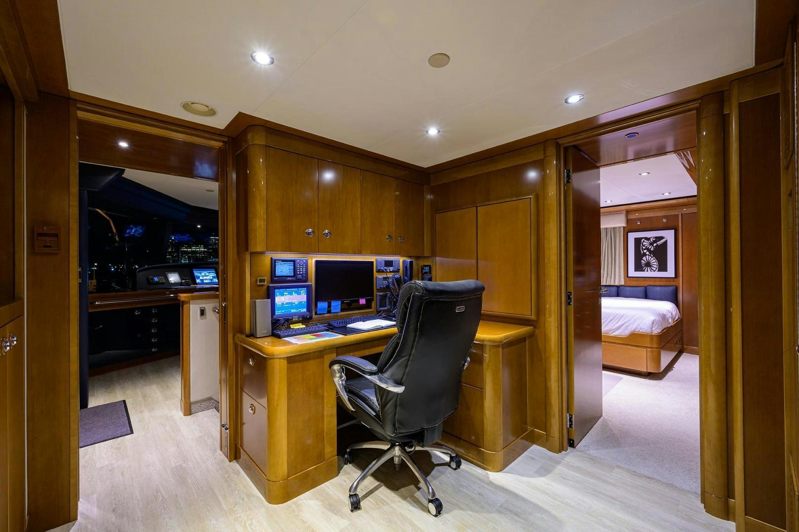 a room with a desk and computer aboard SEANASH Yacht for Sale