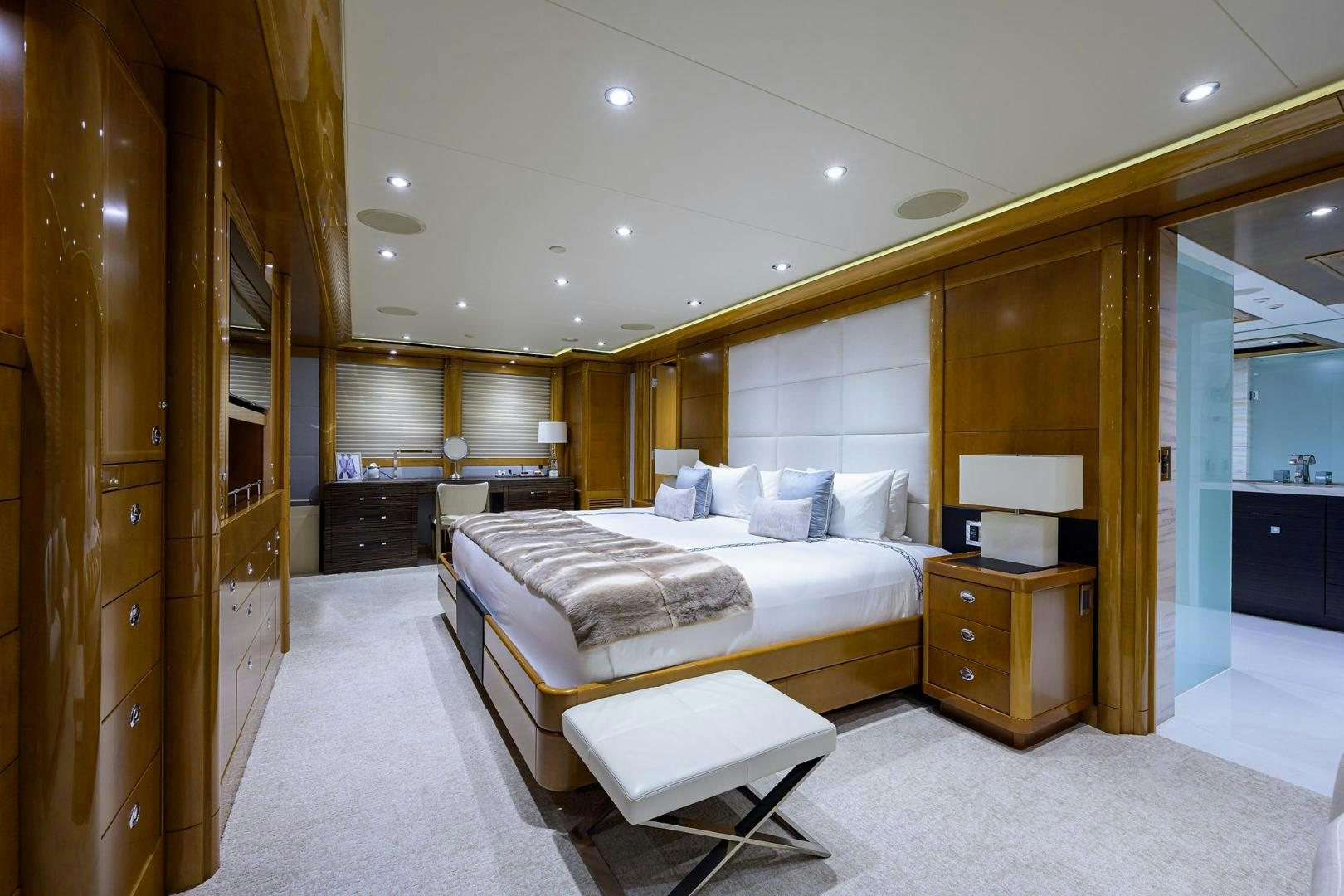a large bedroom with a bed aboard SEANASH Yacht for Sale