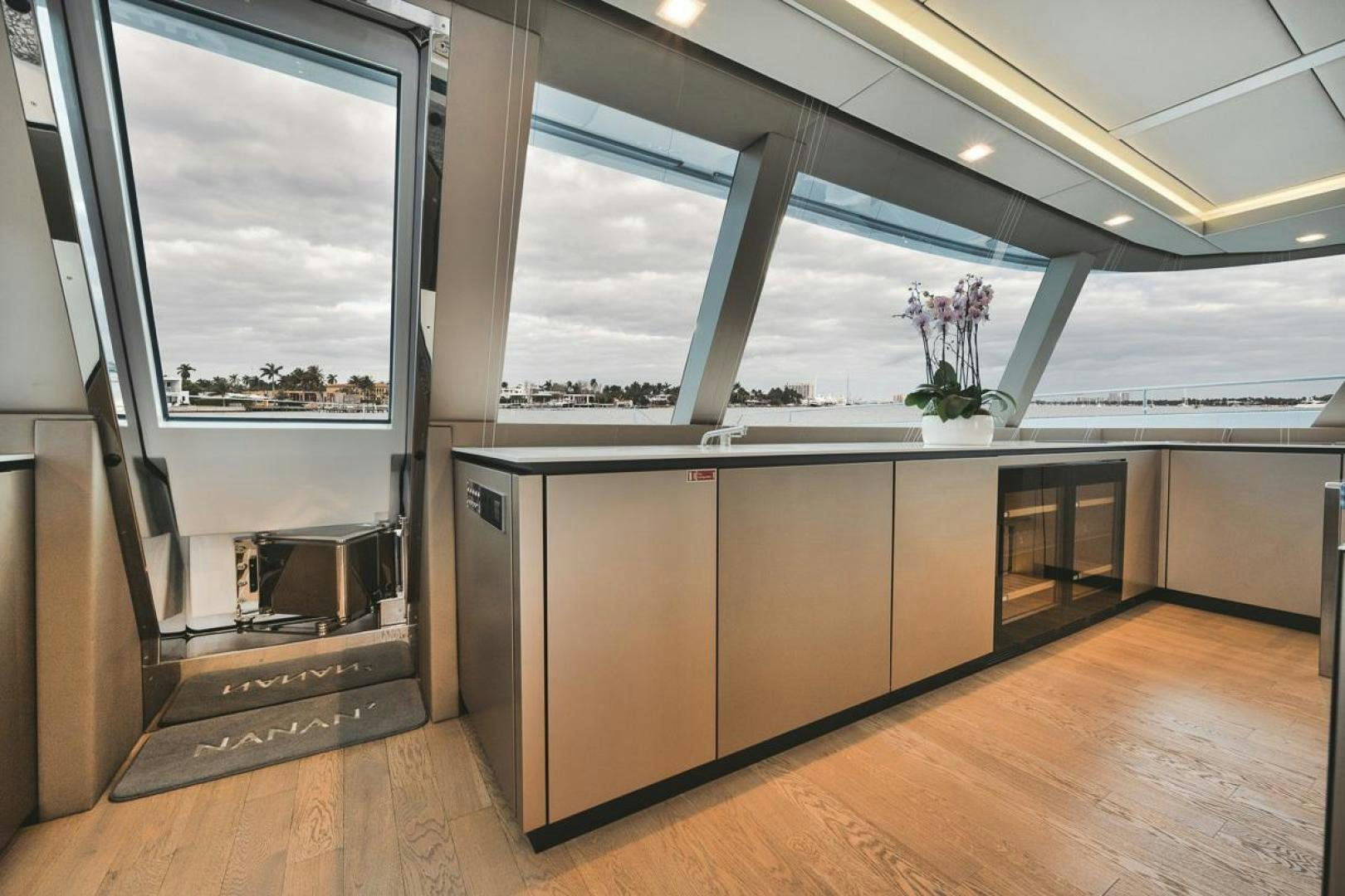 a room with a large window aboard SANDY II Yacht for Sale