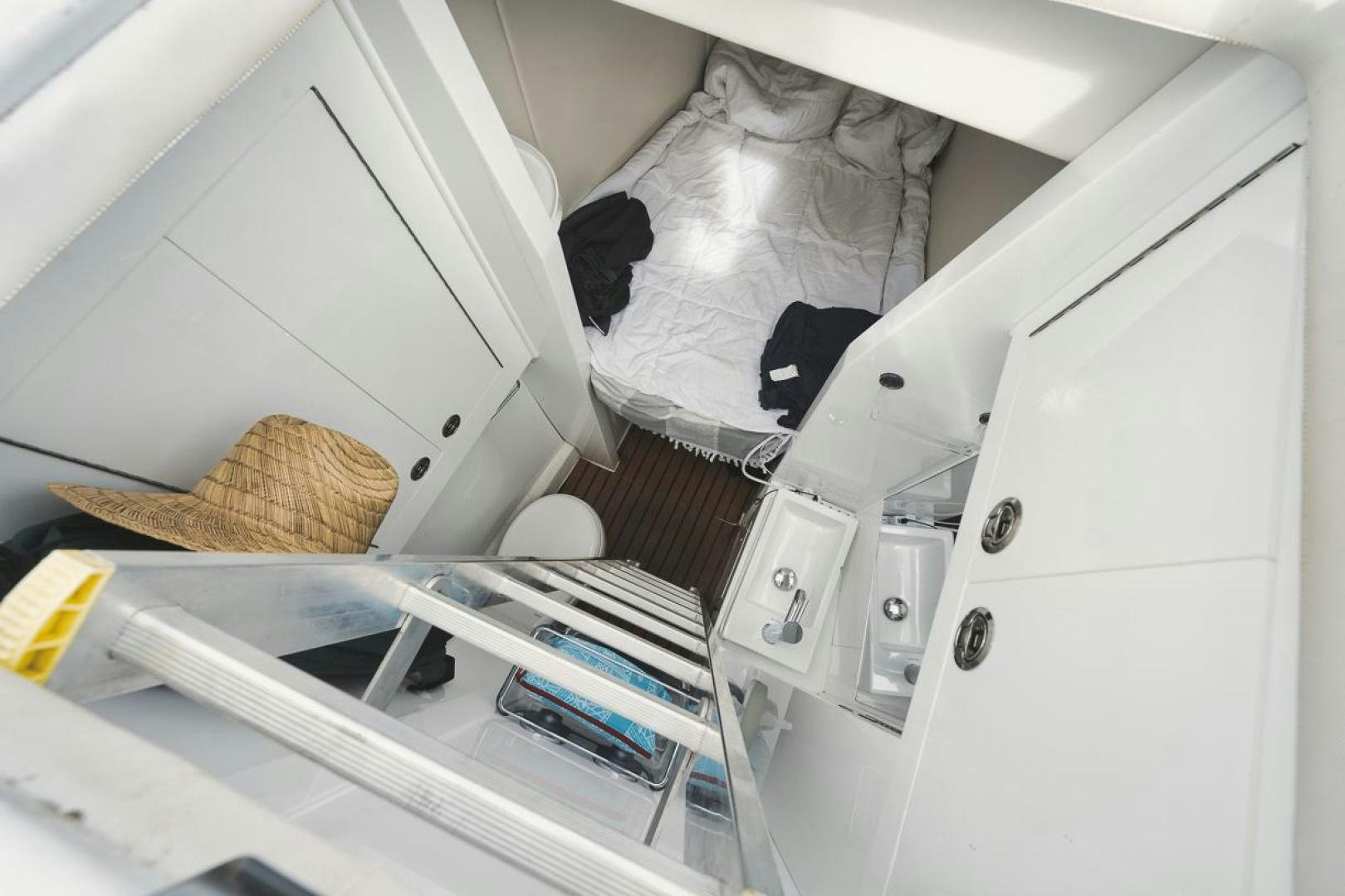 a white cabinet with a black object on it aboard SANDY II Yacht for Sale