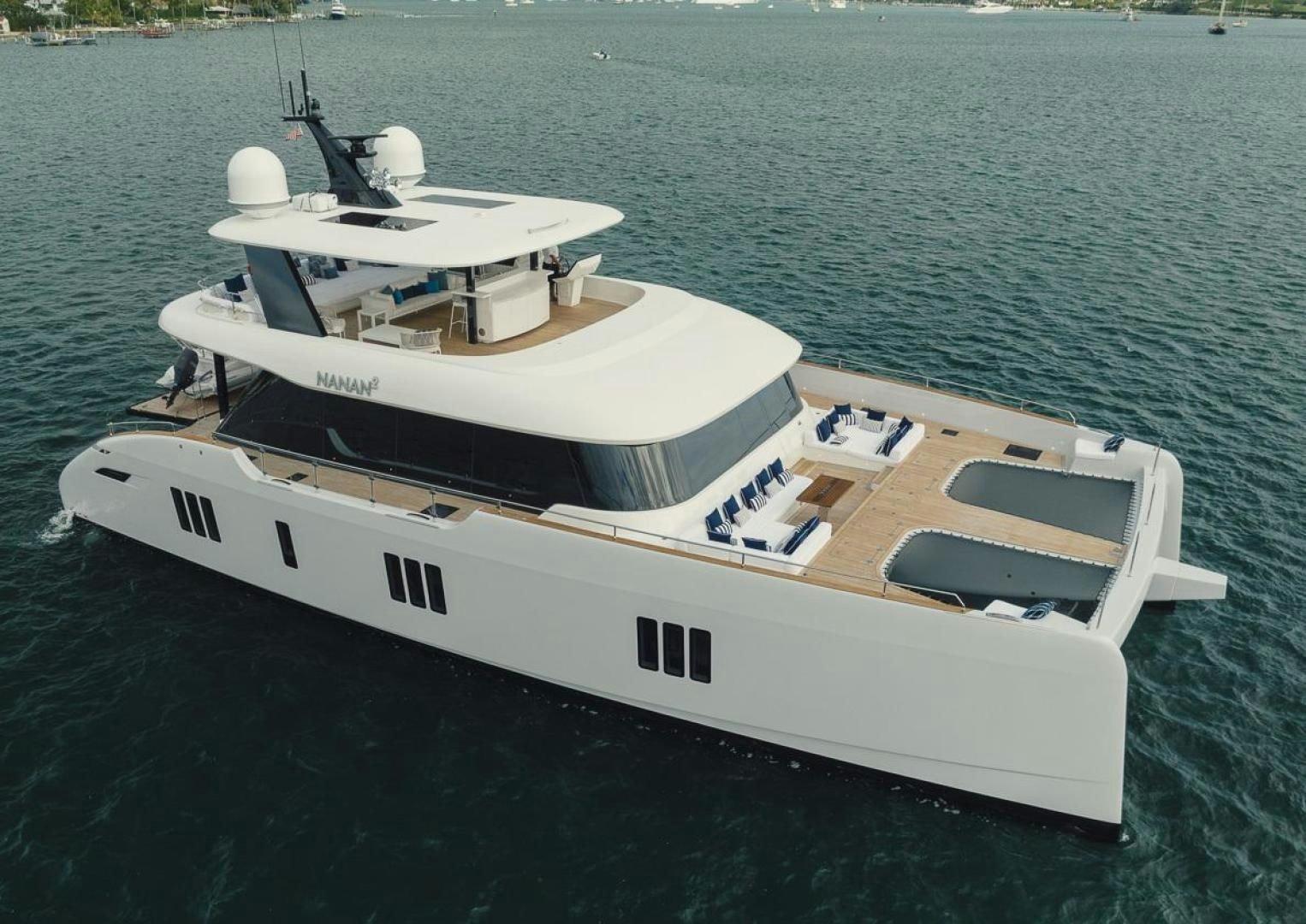 a white boat on the water aboard SANDY II Yacht for Sale