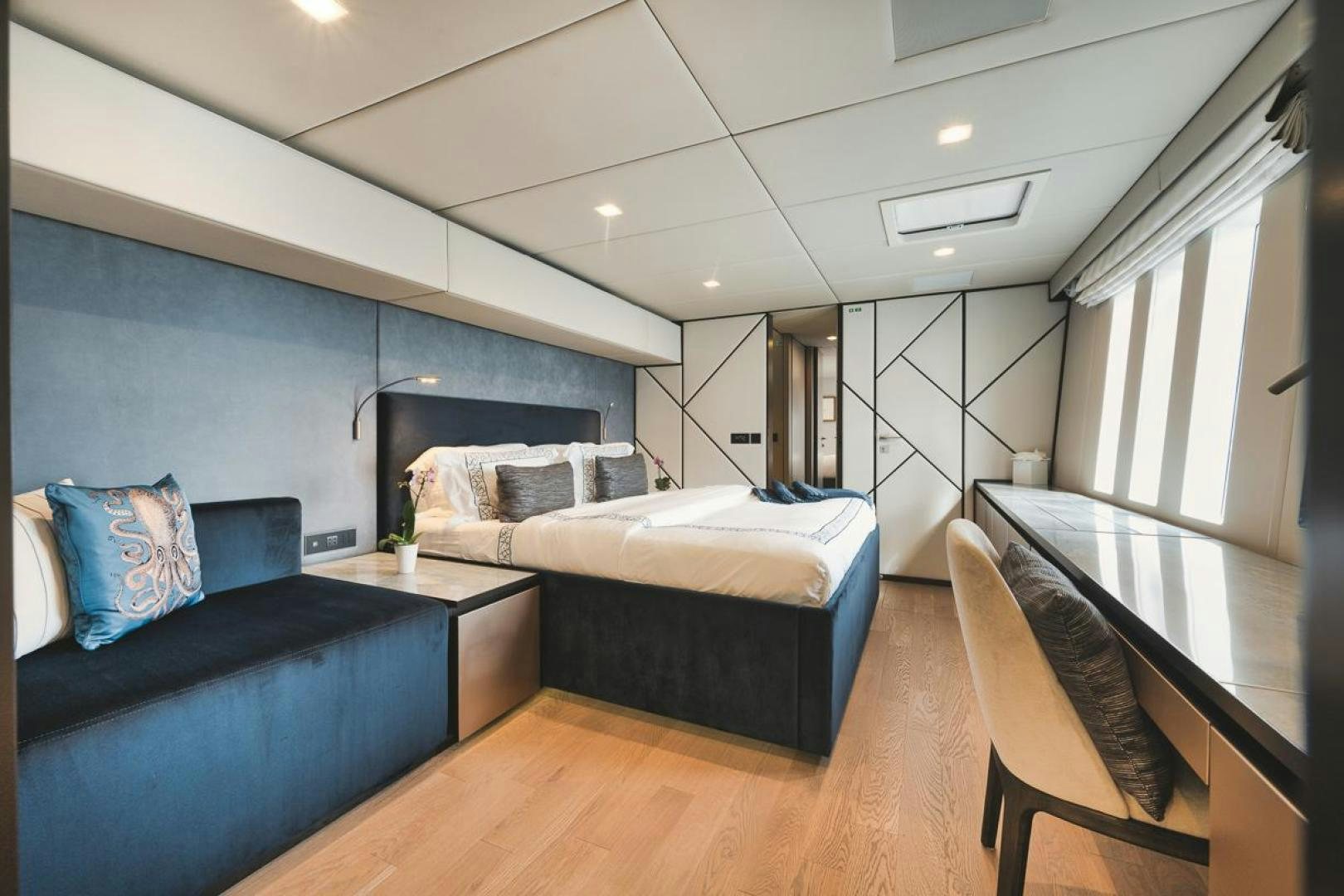 a room with a bed and a couch aboard SANDY II Yacht for Sale