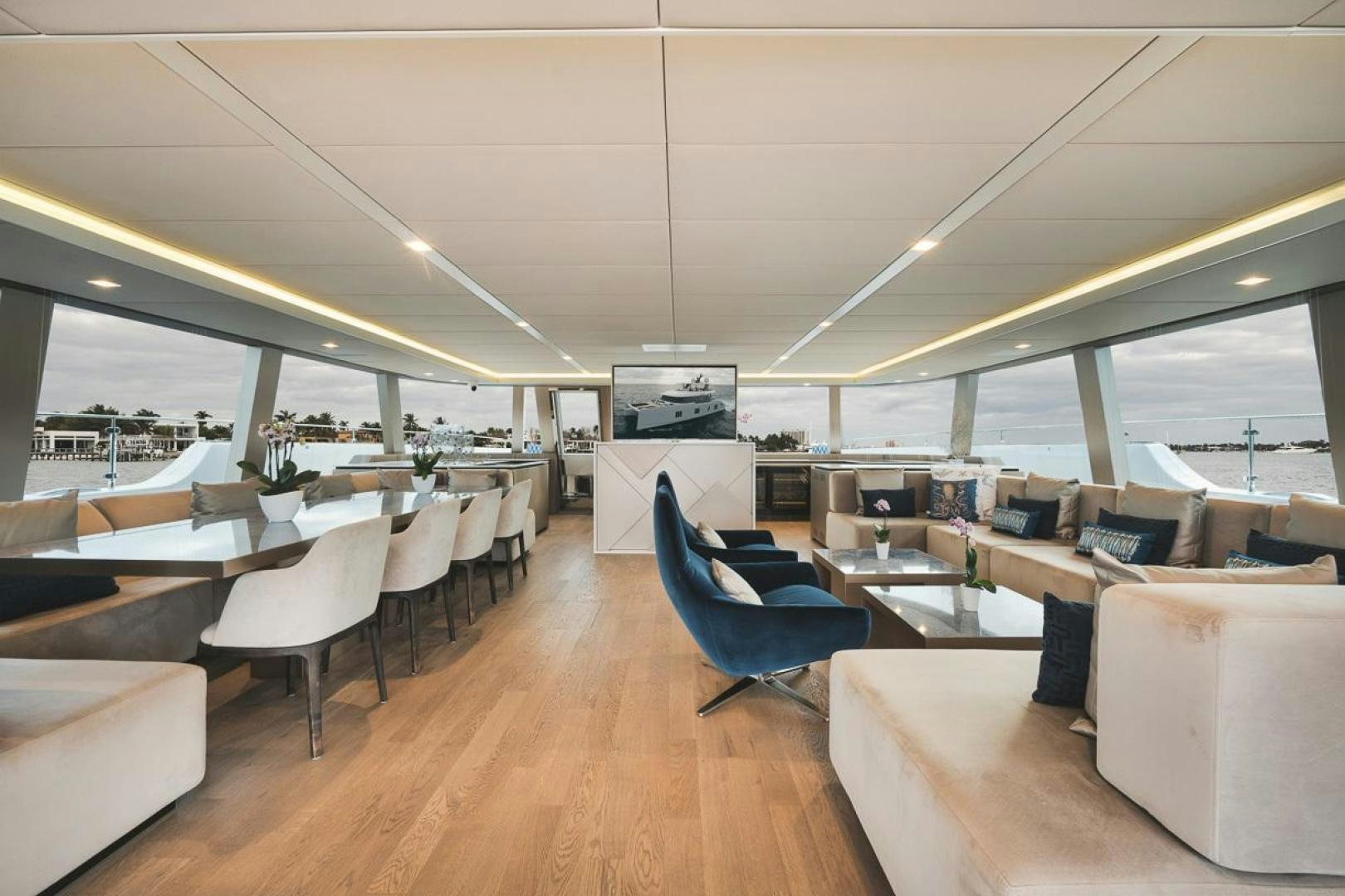 a room with a large window aboard SANDY II Yacht for Sale