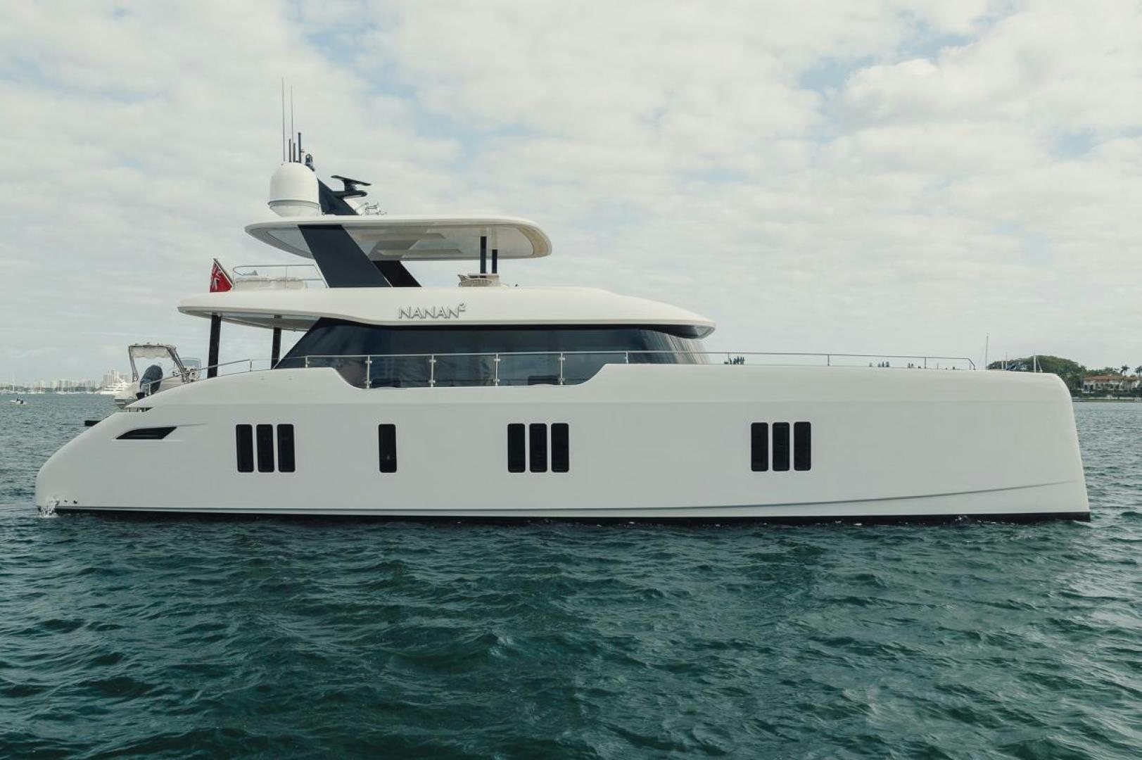 a white yacht in the water aboard SANDY II Yacht for Sale