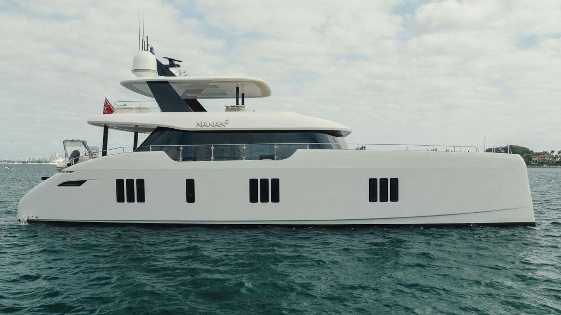a white yacht in the water aboard SANDY II Yacht for Sale