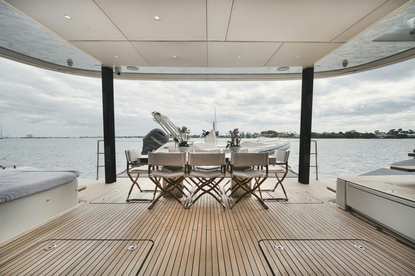 a table and chairs on a deck aboard SANDY II Yacht for Sale