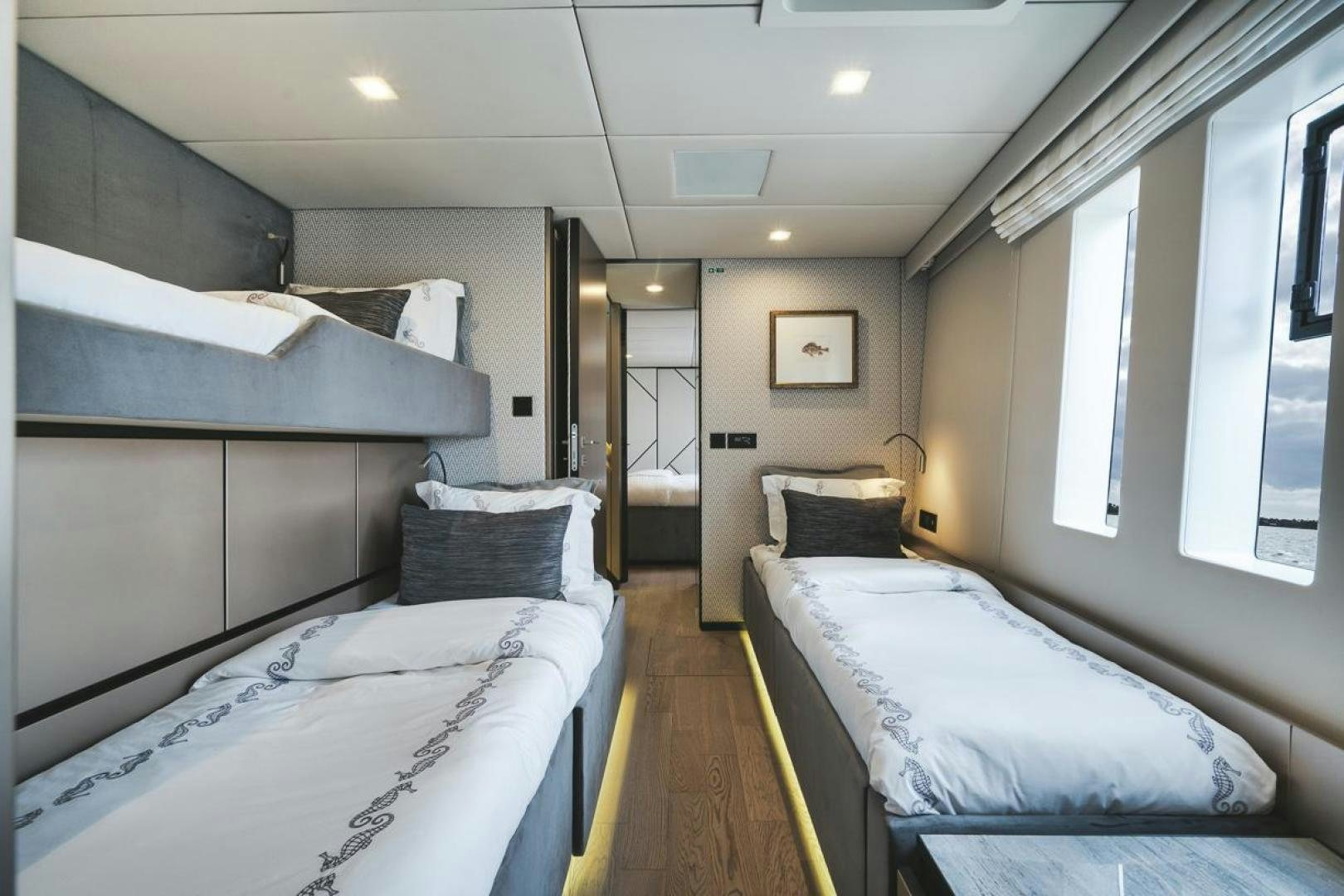 a room with two beds aboard SANDY II Yacht for Sale