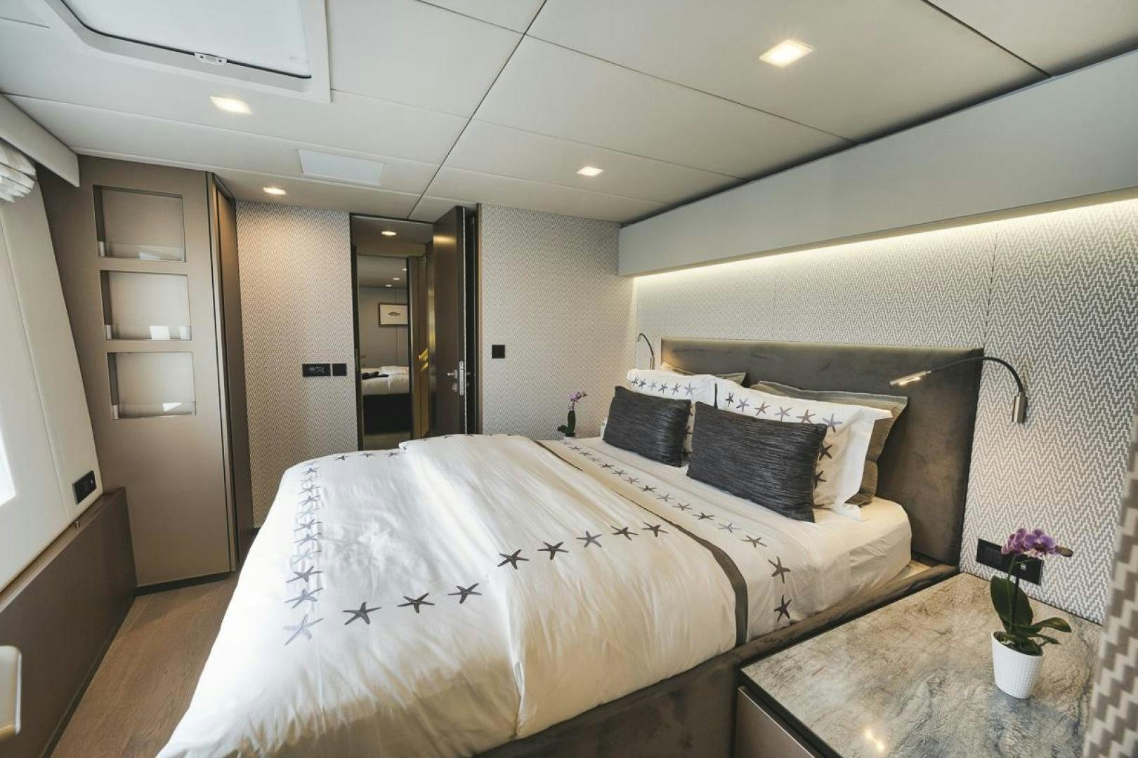 a bed in a room aboard SANDY II Yacht for Sale