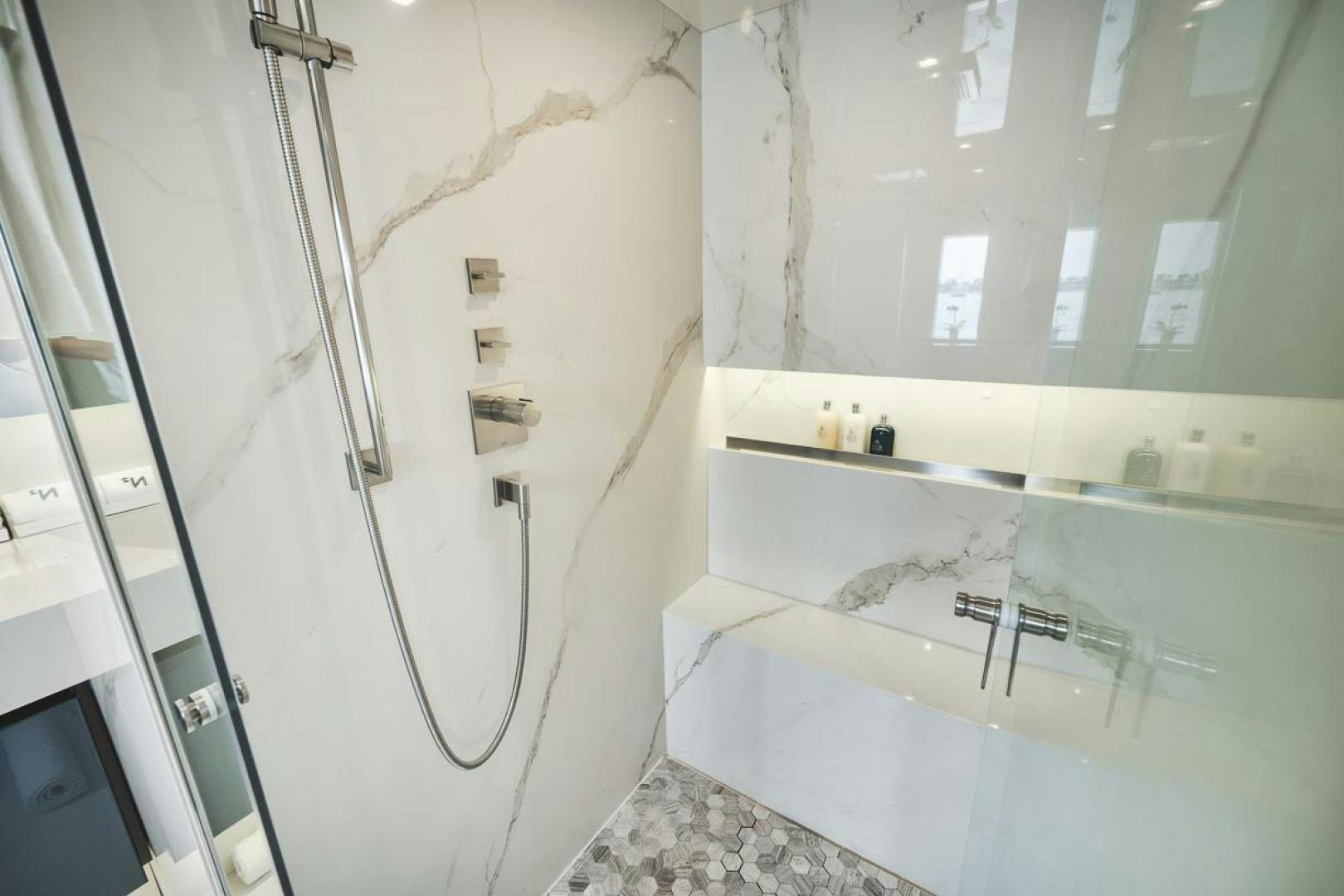 a bathroom with a large bathtub aboard SANDY II Yacht for Sale