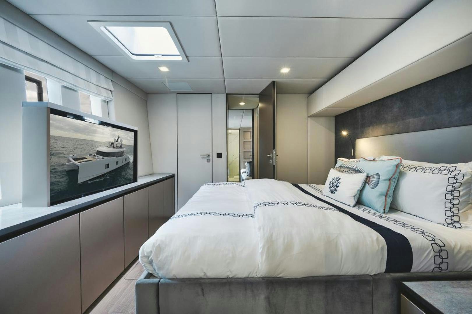 a bed in a room aboard SANDY II Yacht for Sale