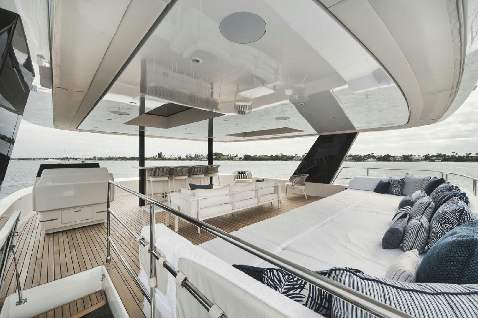 a large white tent with a bed and a couch aboard SANDY II Yacht for Sale