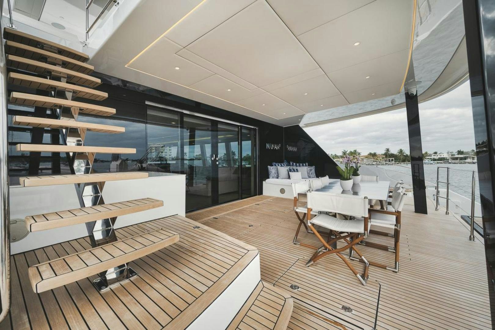a room with a table and chairs aboard SANDY II Yacht for Sale