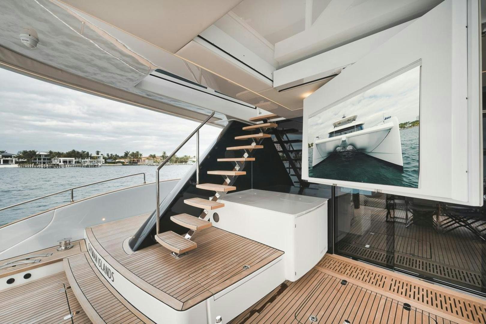 a room with a large window and a view of the water aboard SANDY II Yacht for Sale