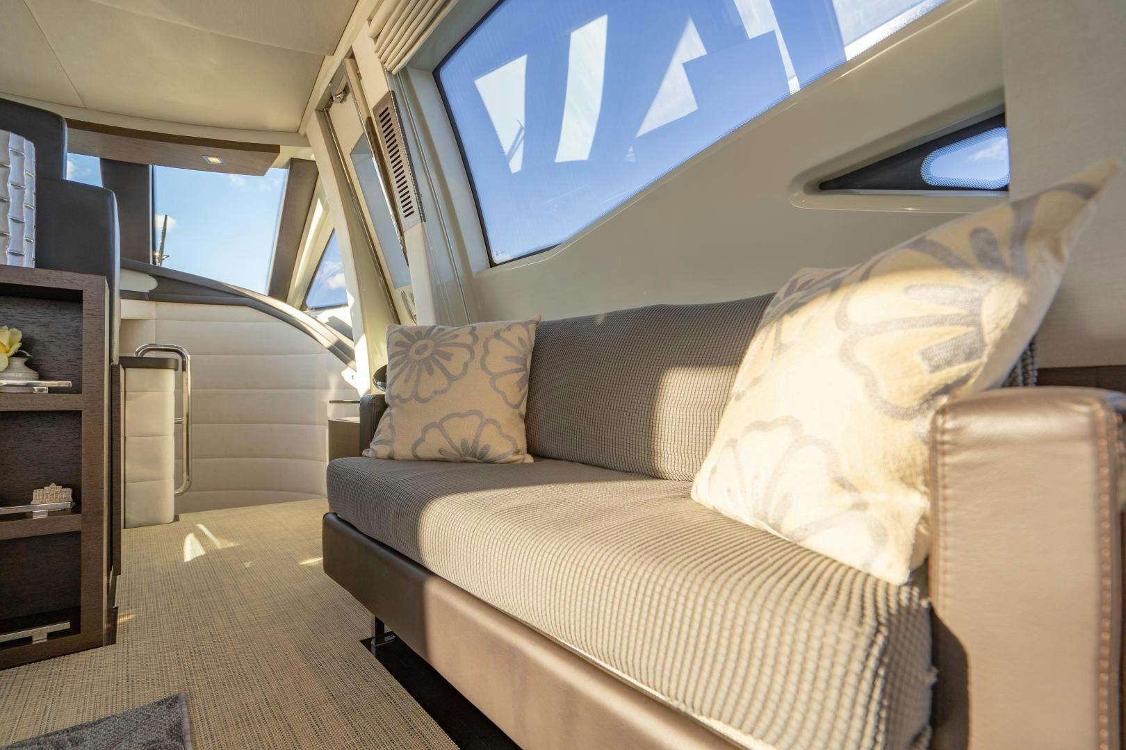 a couch in a train aboard PLANE II SEA Yacht for Sale