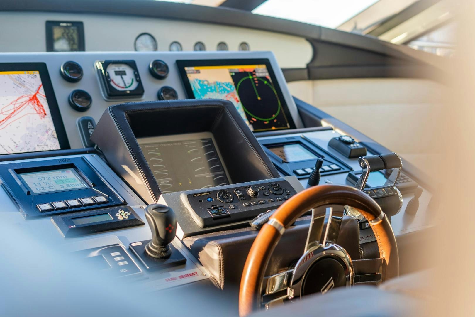 a machine with a steering wheel aboard PLANE II SEA Yacht for Sale