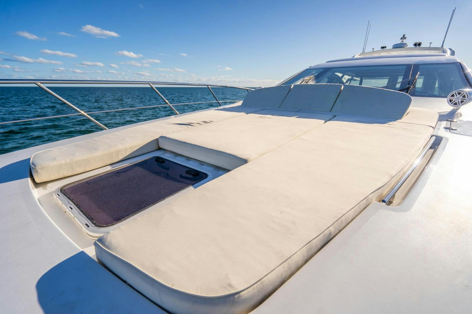 a white boat on the water aboard PLANE II SEA Yacht for Sale