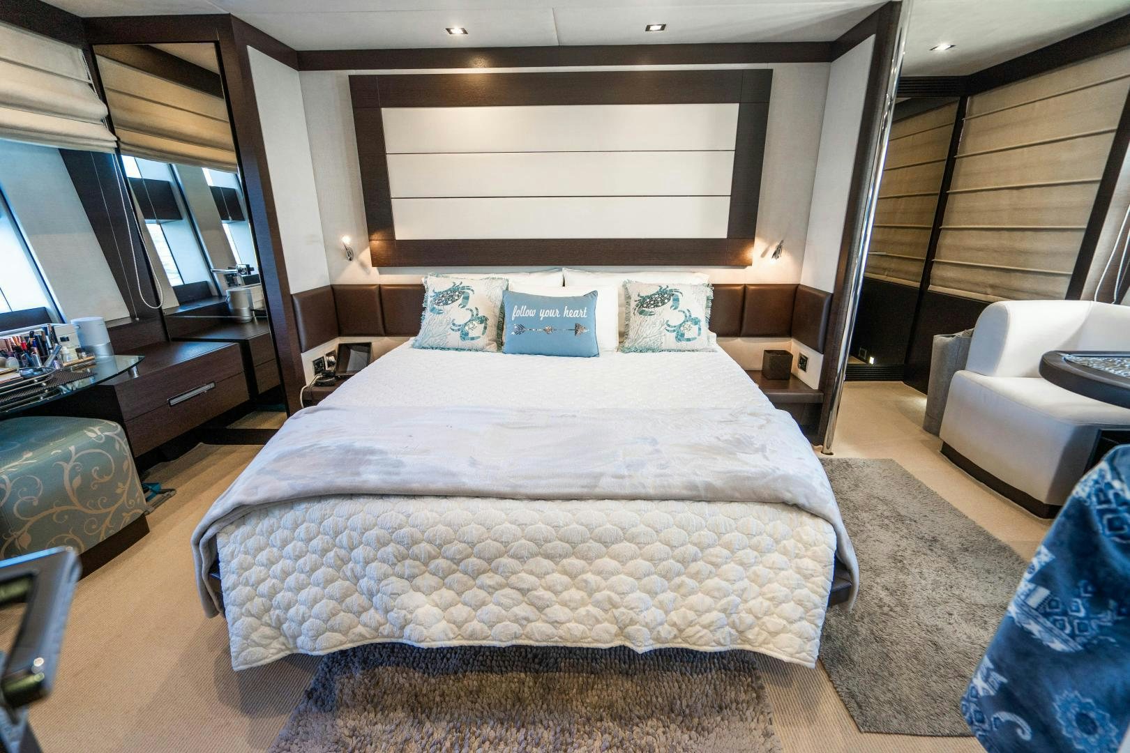 a bed in a room aboard PLANE II SEA Yacht for Sale