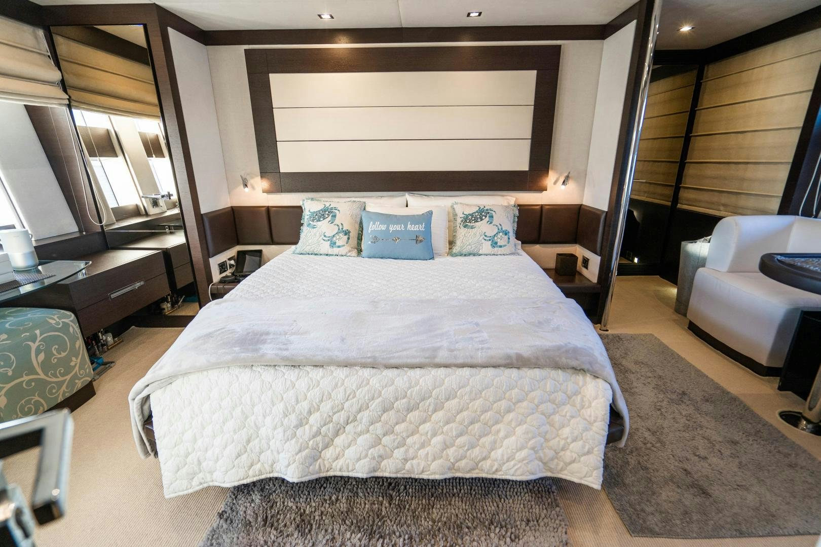 a bed in a room aboard PLANE II SEA Yacht for Sale