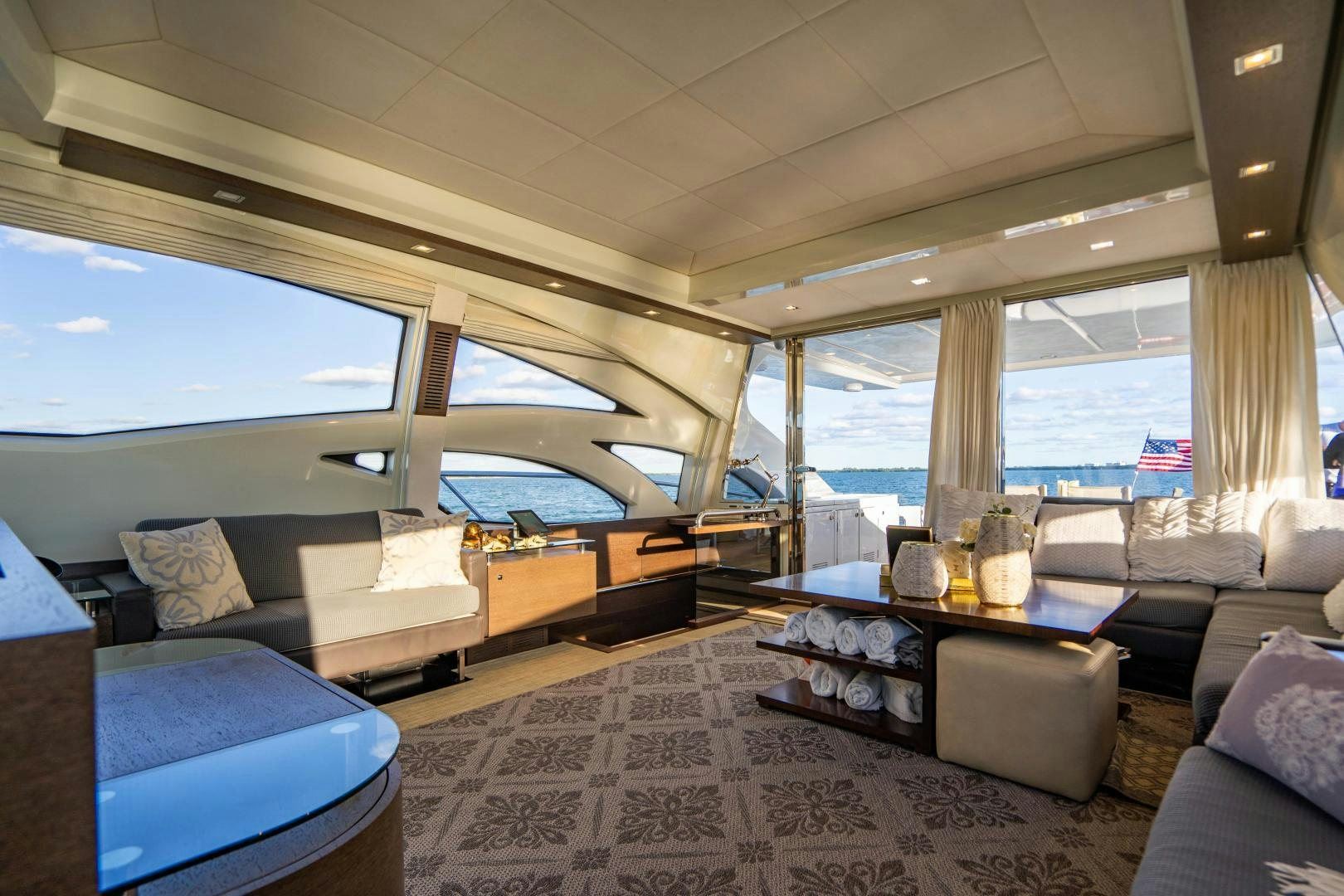 a room with a bed and a table aboard PLANE II SEA Yacht for Sale