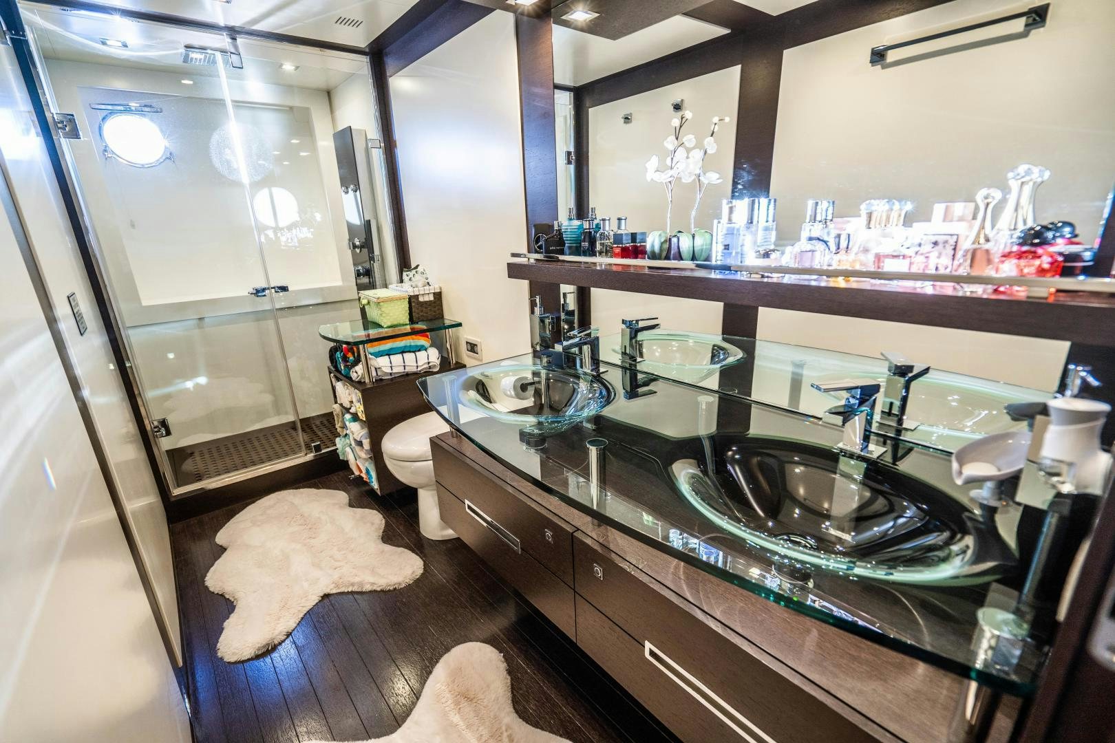 a bathroom with a large counter aboard PLANE II SEA Yacht for Sale