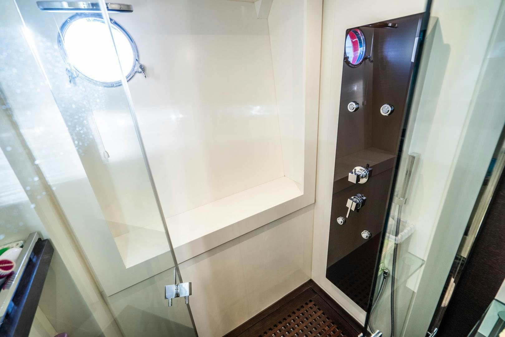 a door with a glass window aboard PLANE II SEA Yacht for Sale