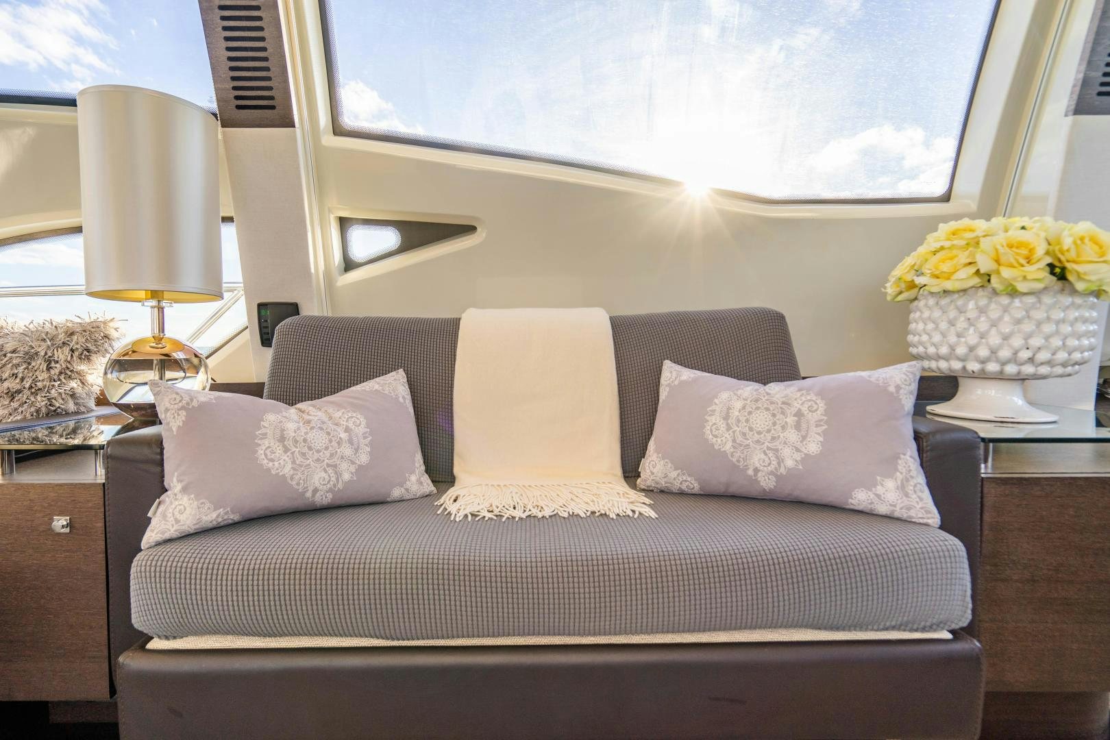a bed with pillows and pillows aboard PLANE II SEA Yacht for Sale