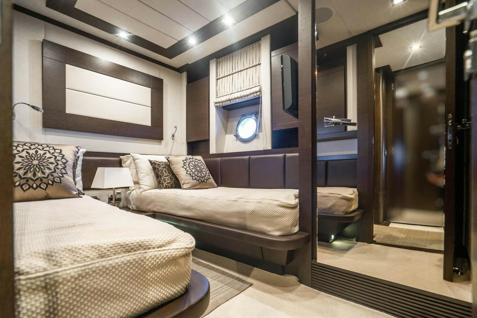 a room with two beds aboard PLANE II SEA Yacht for Sale
