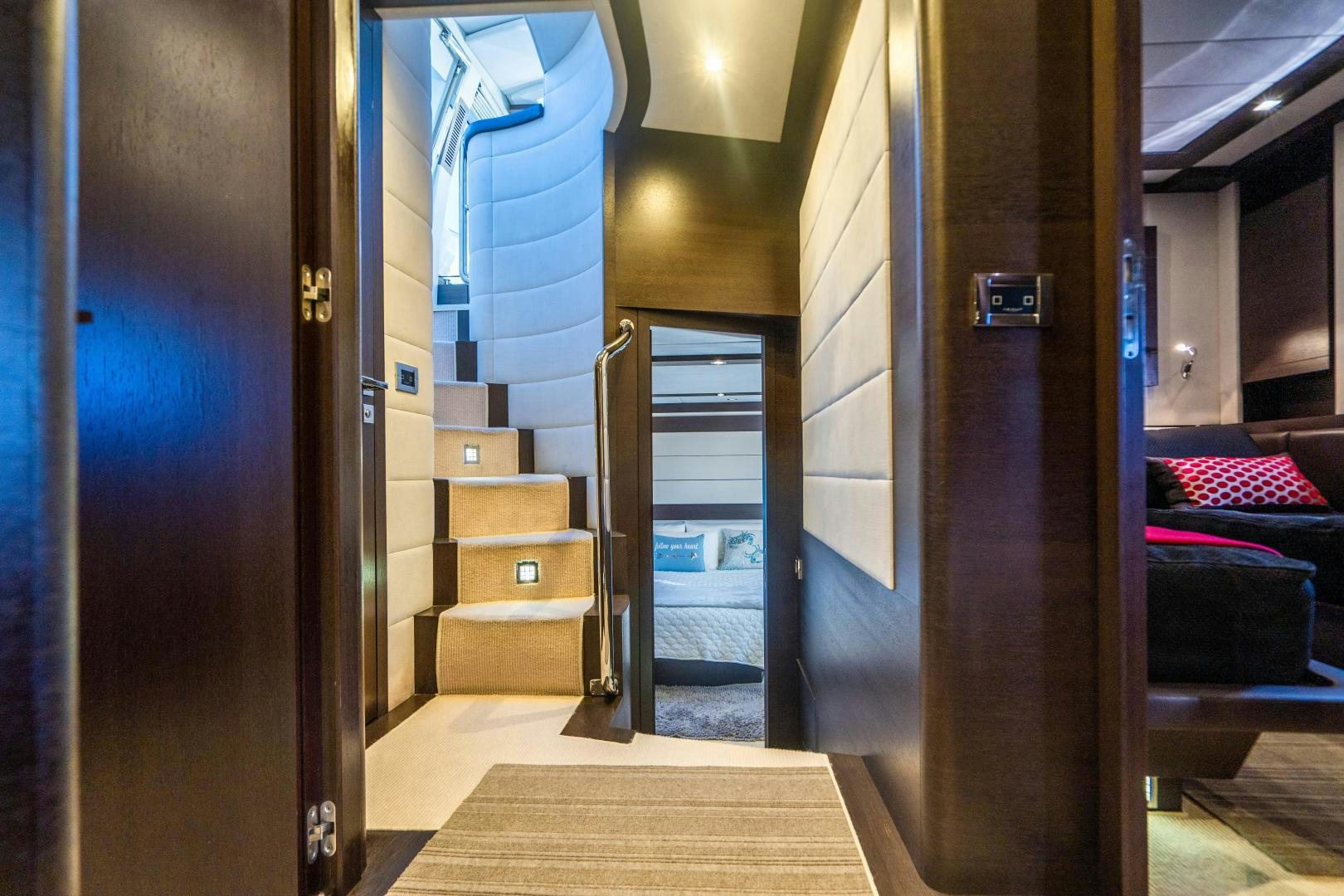 a room with a bed and a closet aboard PLANE II SEA Yacht for Sale