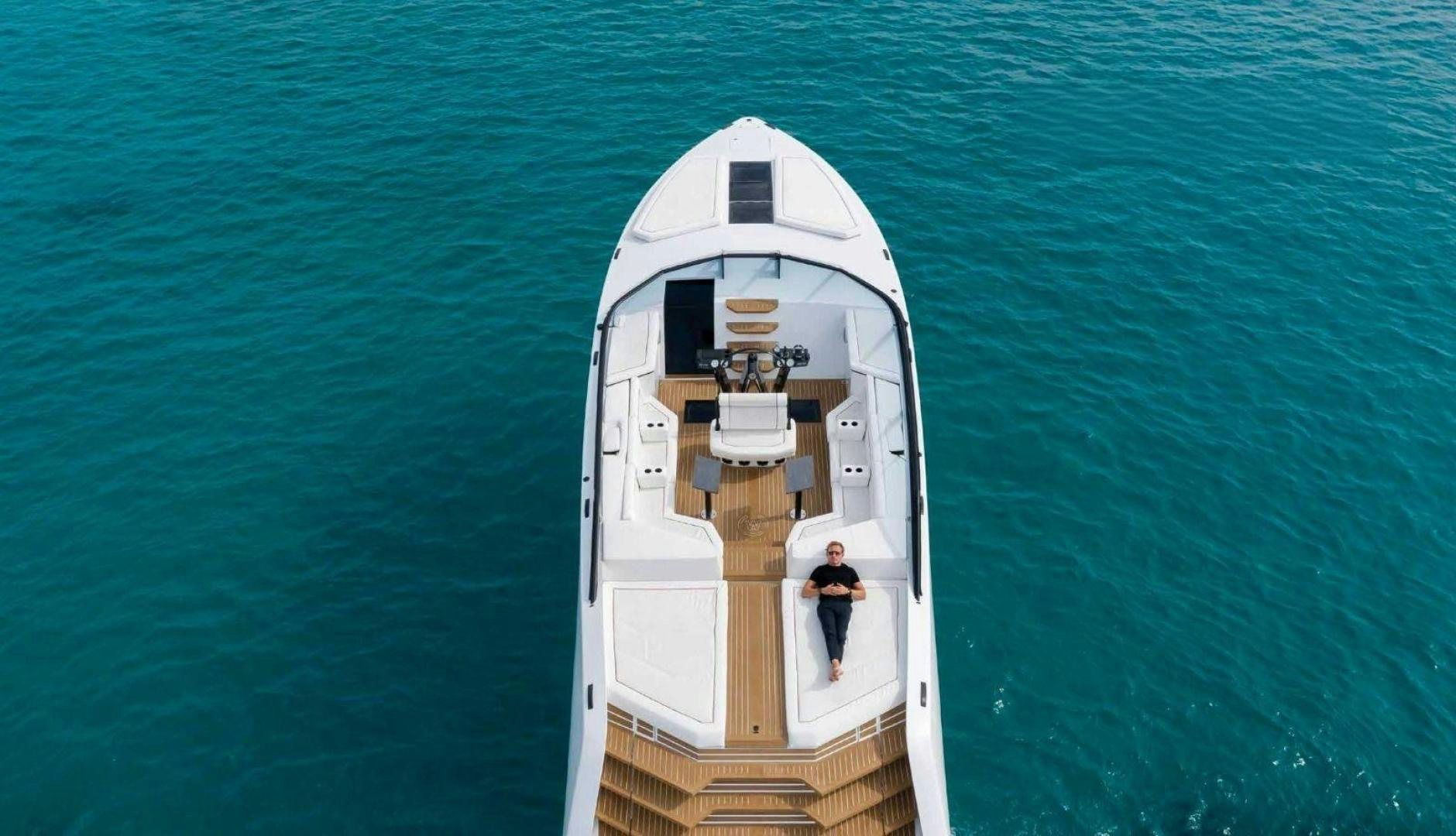 a person standing on a boat aboard BENEAU WATERDREAM 52 Yacht for Sale