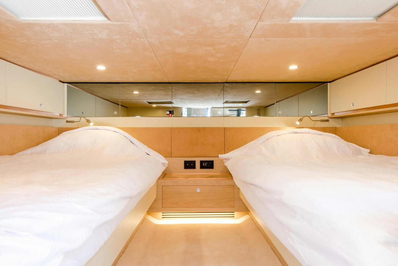 a room with two beds aboard BENEAU WATERDREAM 52 Yacht for Sale