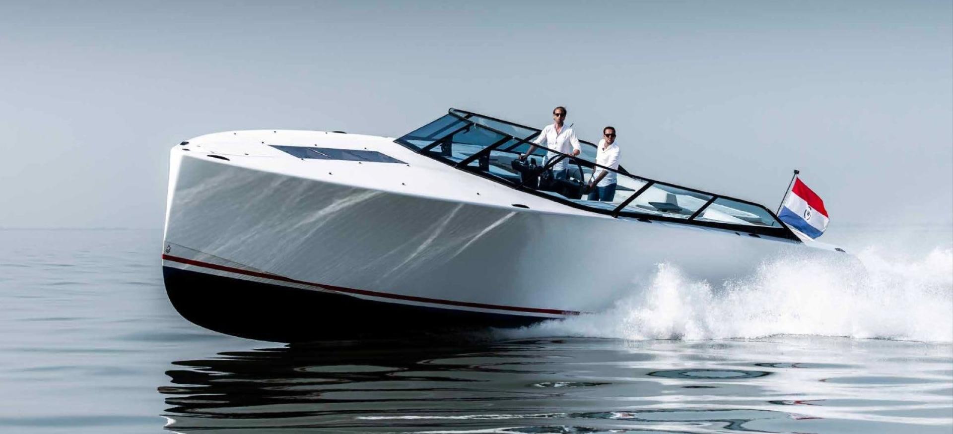 a boat with a flag on the front aboard BENEAU WATERDREAM 52 Yacht for Sale