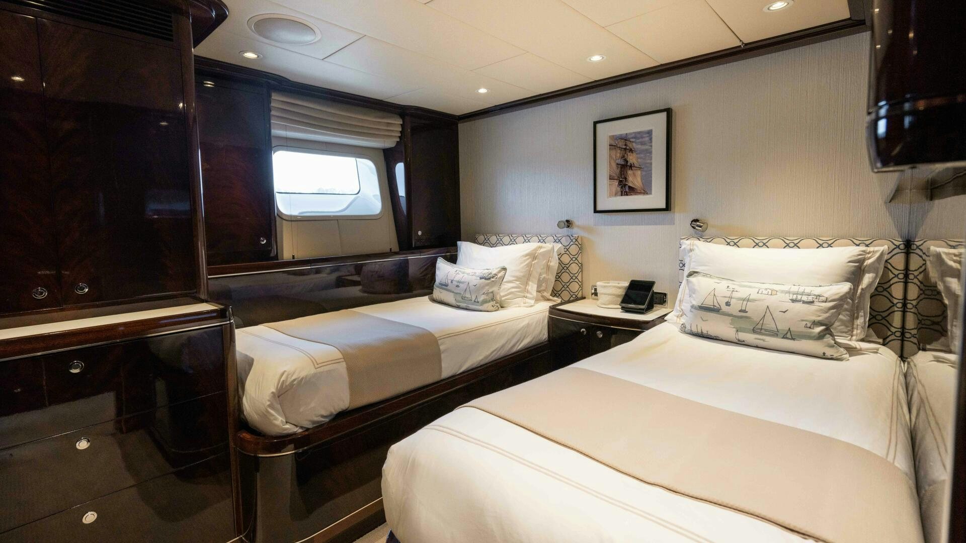 a room with two beds aboard ANEMOI Yacht for Sale