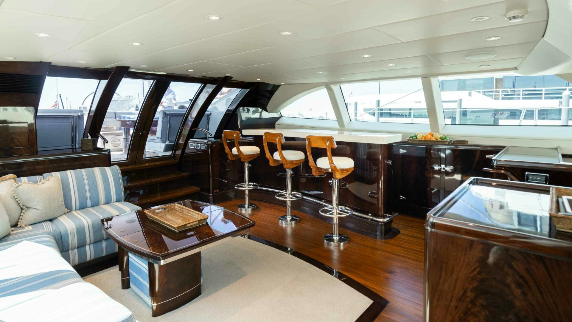 a room with a table and chairs aboard ANEMOI Yacht for Sale