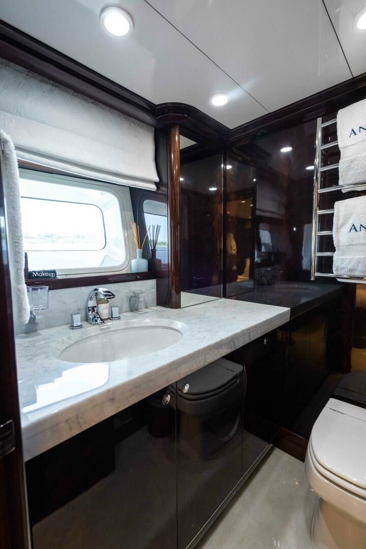 a bathroom with a sink and a toilet aboard ANEMOI Yacht for Sale