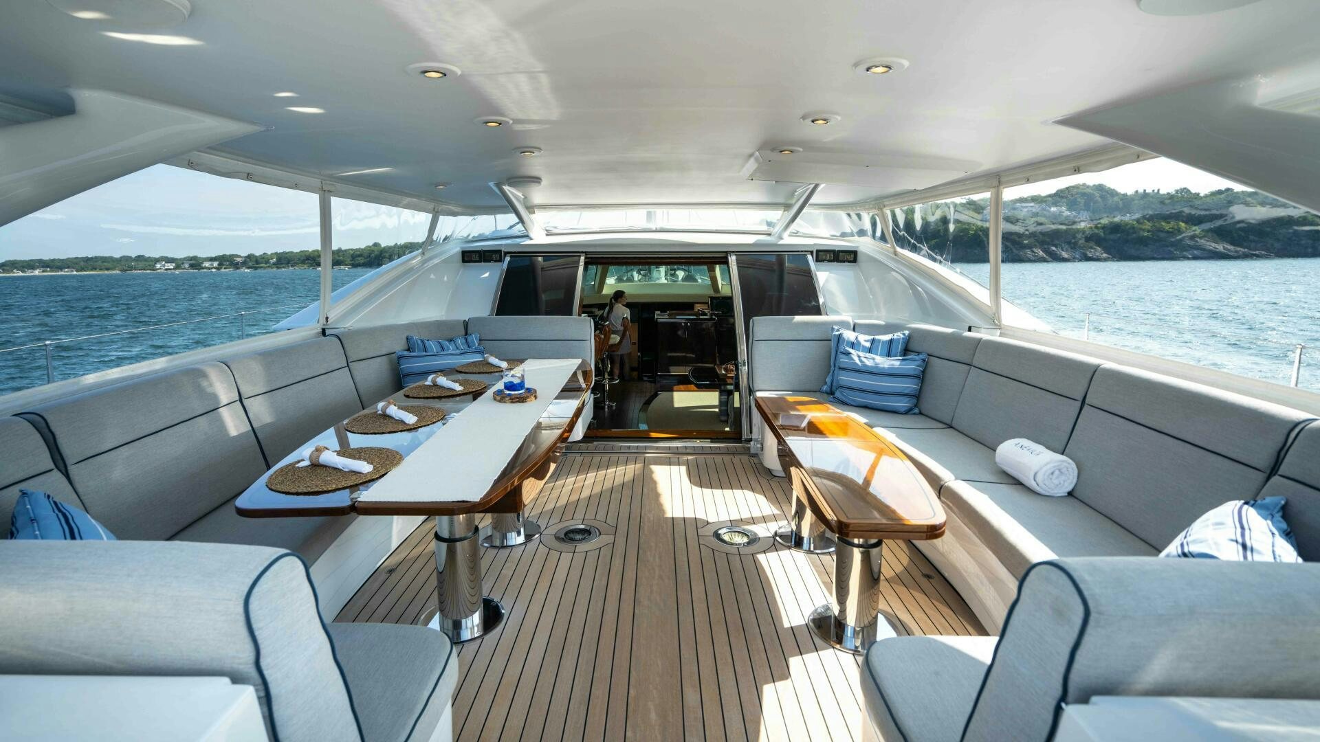 a boat with a table and chairs aboard ANEMOI Yacht for Sale